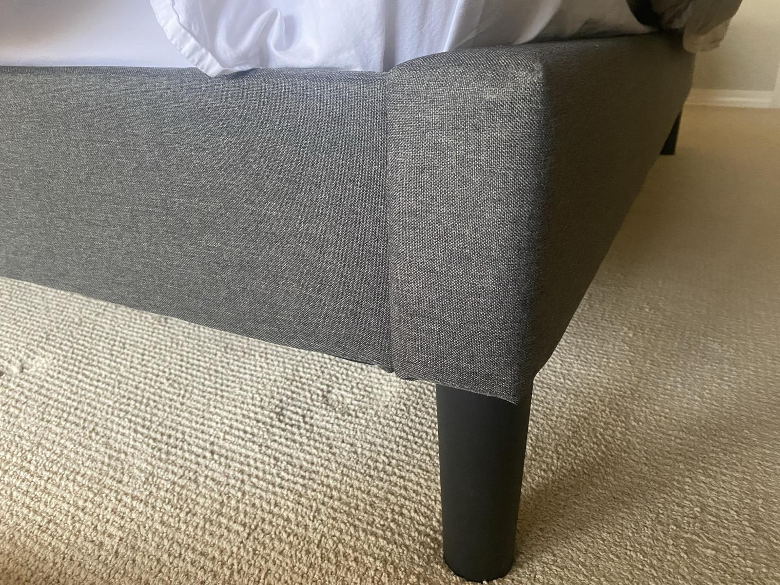 Low quality bed frame corner support